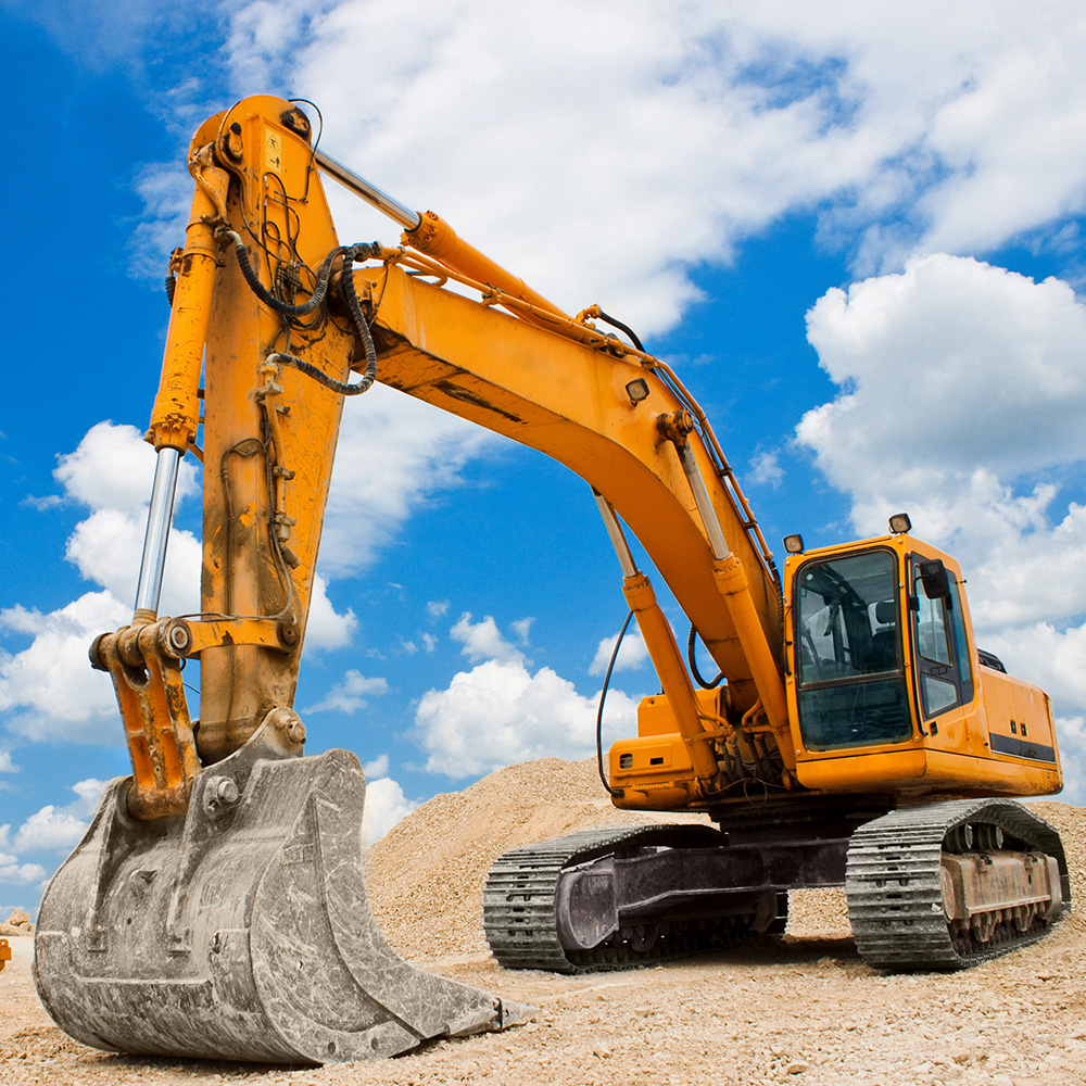 excavadora-sobre-terreno-tierra